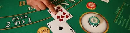 Live casino dealer table with multi-camera angles and interactive controls